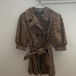 Size 2 , over coat double breasted with puff sleeve . New by Sheri Drobnick